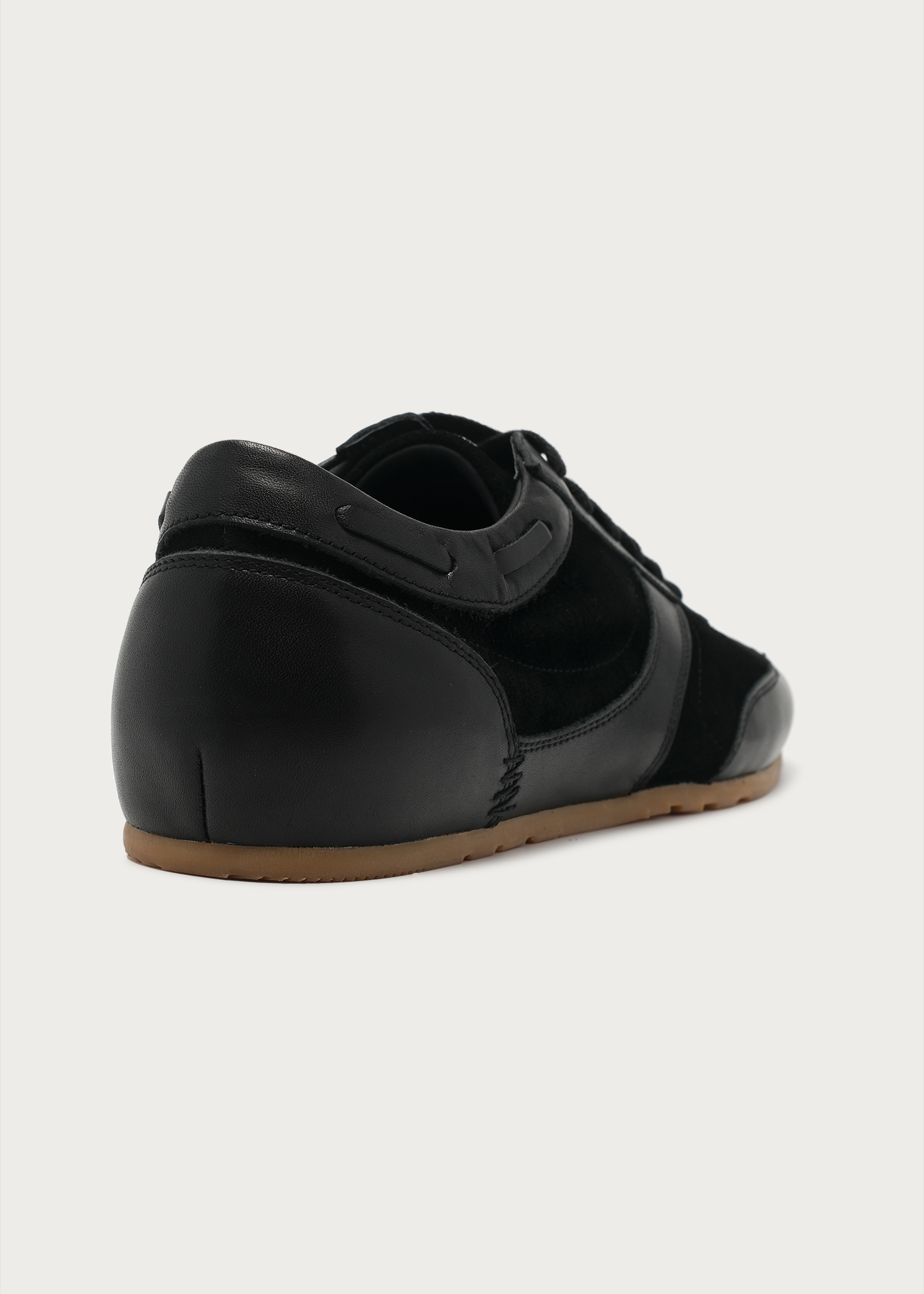 Black leather sneakers styling angle
