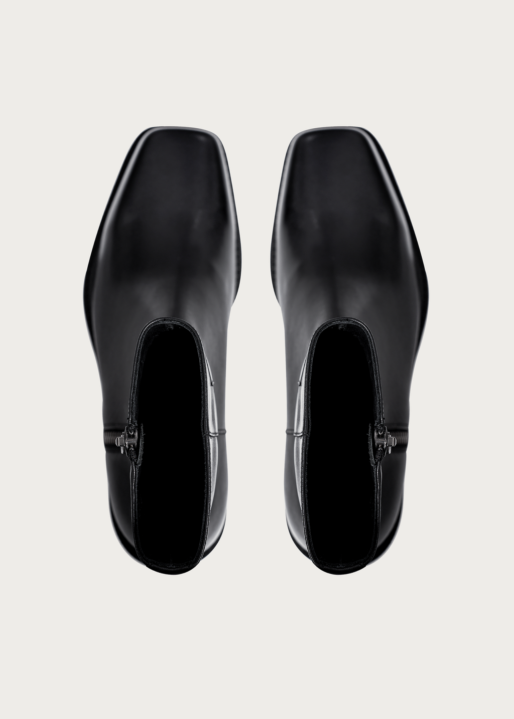 Square-toe black ankle boots side profile