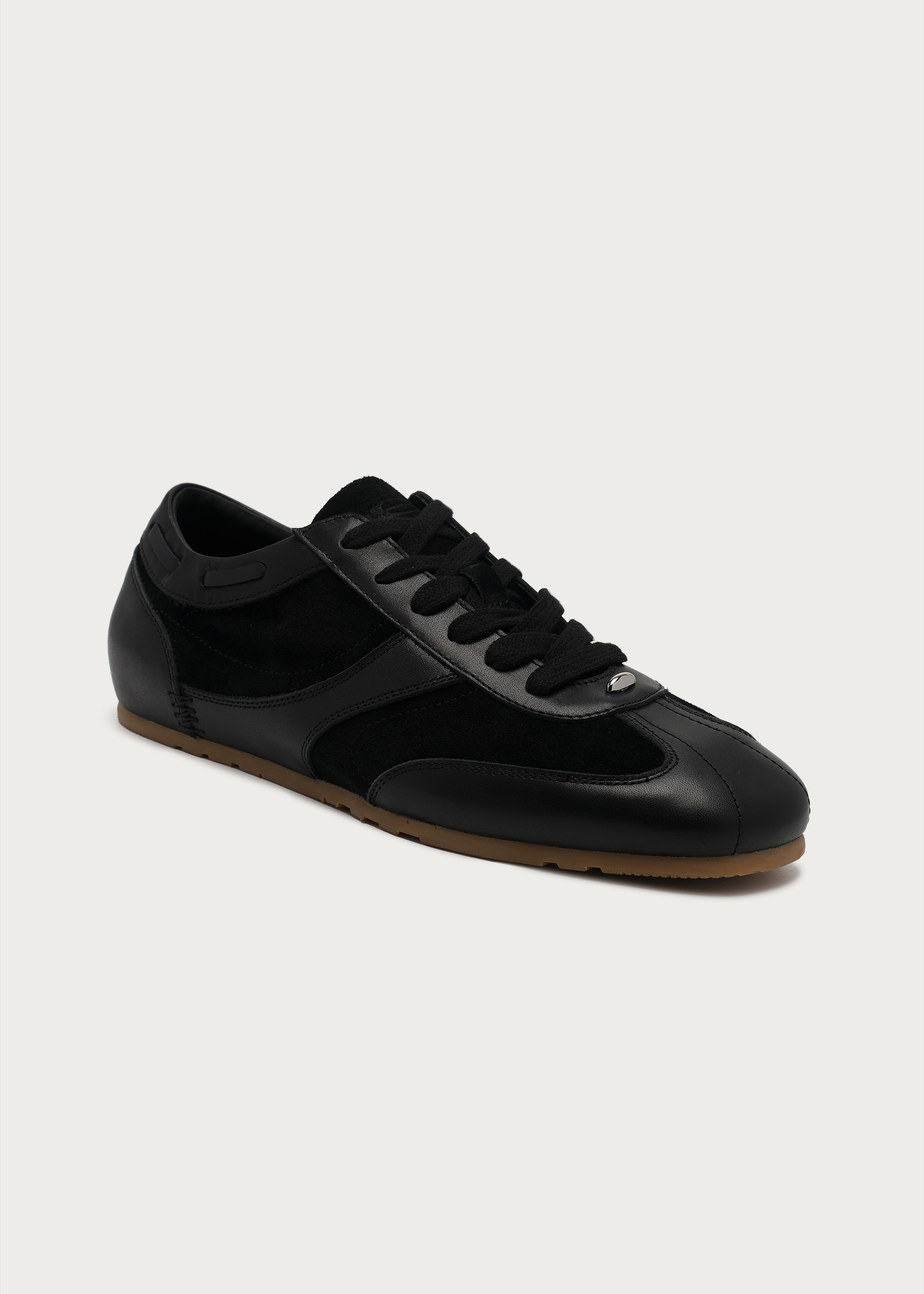 Black leather sneaker heel detail