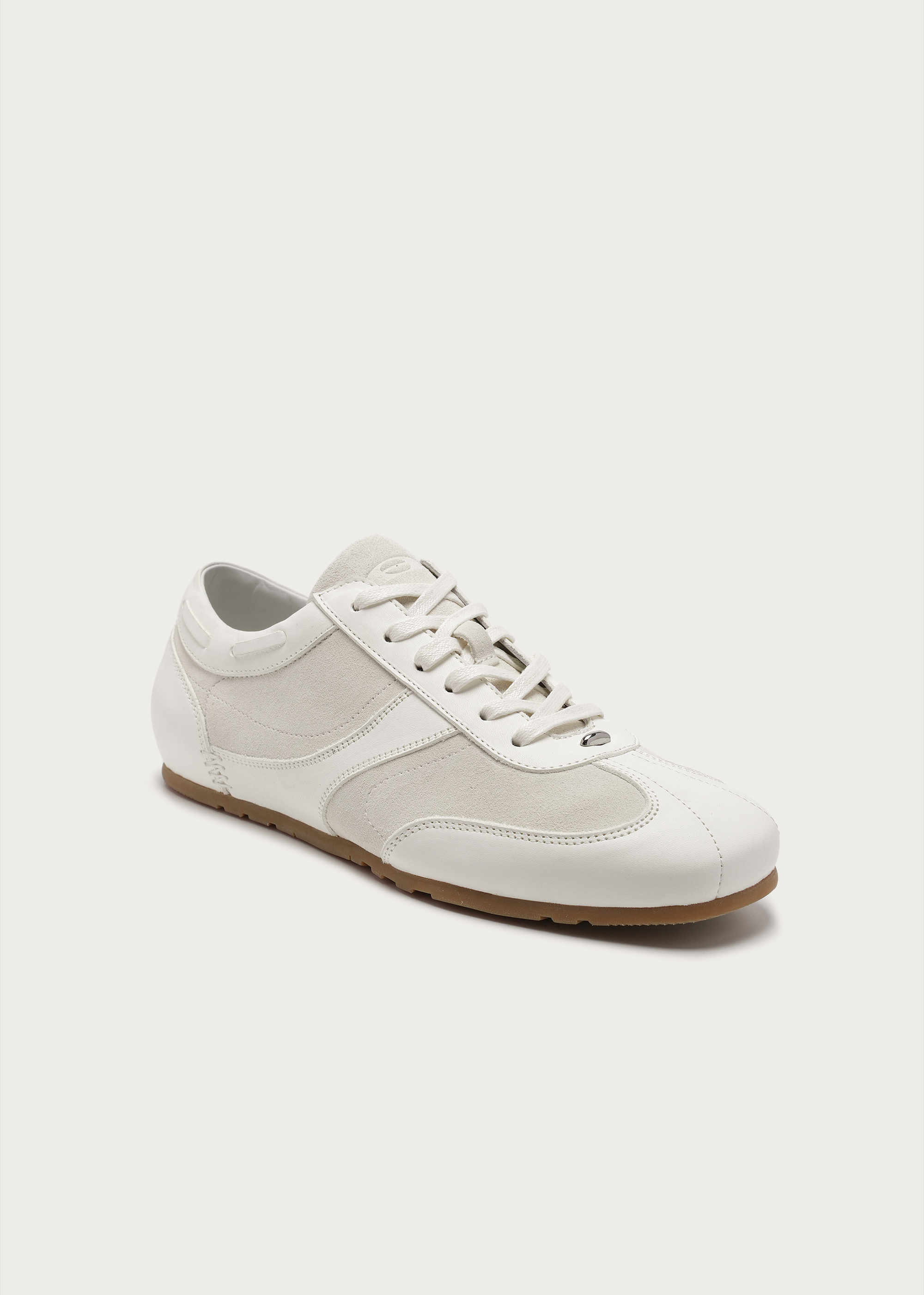 White leather sneaker heel detail