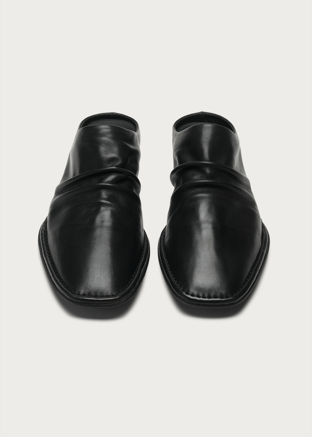 Riven Wrinkle Leather Mules Black