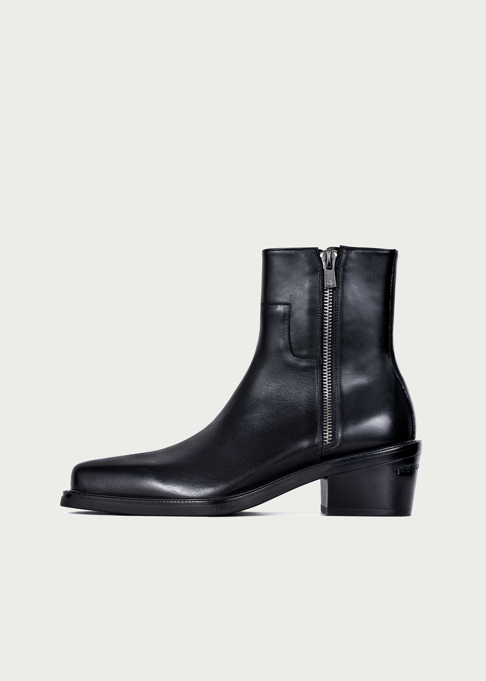 Black square-toe ankle boots front view