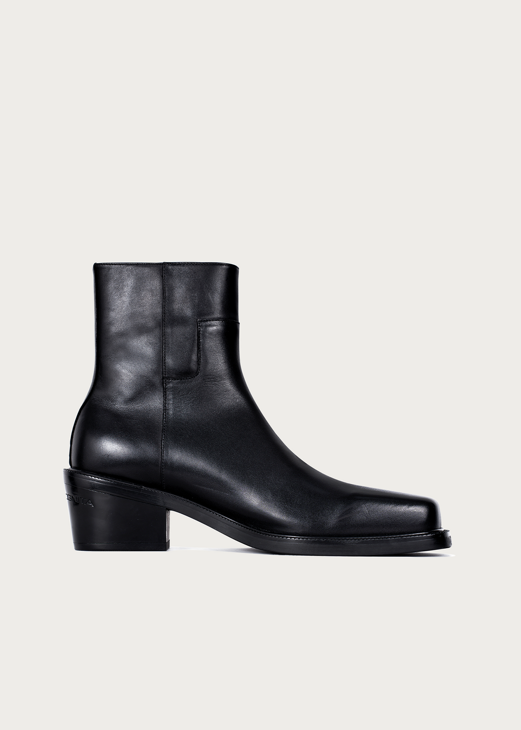 Black calf leather ankle boots worn styling