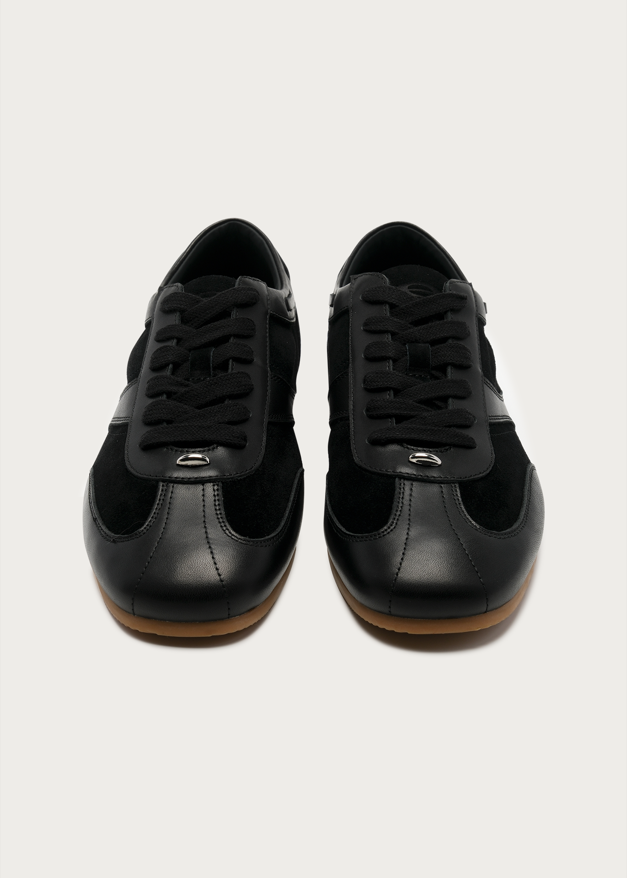 Metal-embellished sneakers black on foot